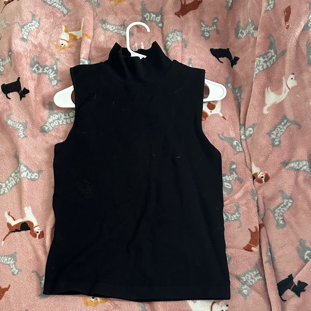 2 Sleeveless Turtleneck Tops